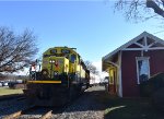 The 3016 rests with its train at the restored Wyckoff Station